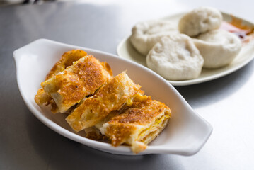 Golden fried pancake with egg filling