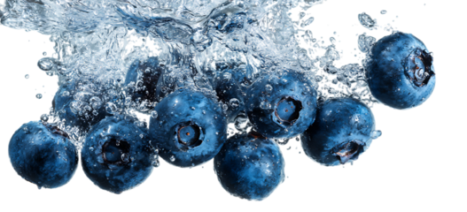 Blueberries fall into the water, creating splashes of blueberry juice in the air. The fresh and juicy berries are adorned with drops of liquid.