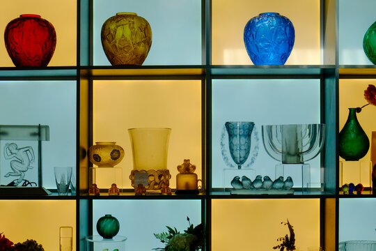 Paris, France, Europe.  The famous and worlds largest flea market - the St. Ouen "Marche des Puces.Display of hand blown antique art glass