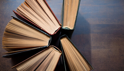 Old books arranged highlighting their historical significance. Neatly arranged representing a collection of wisdom