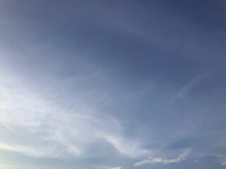 Dreamlike Cirrus Cloud Swirls Over Hanoi’s West Lake Under a Crystal-Clear Blue Sky in Hanoi, Vietnam