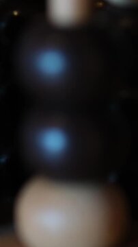 Old wooden abacus on wooden surface close up