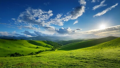 Obraz premium serene landscape a picturesque scene unfolds as rolling green hills are embraced by a radiant blue sky dotted with fluffy clouds creating a sense of tranquility and natural beauty