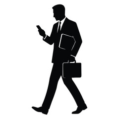 A businessman in a suit walking while looking at his smartphone and carrying a briefcase and folder a striking silhouette