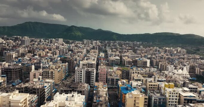 Aerial view of Navi Mumbai near Navi Mumbai International Airport, showing modern roads, scenic surroundings, and urban infrastructure. Ideal for smart city and development themes. 