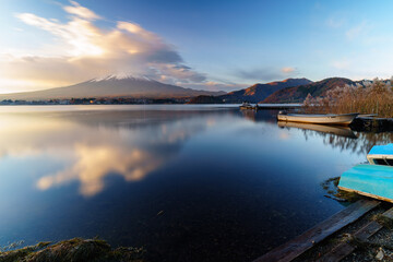 Sunrise Symphony: Reflection of Mount Fuji with Glowing Cloud on Lake Surface