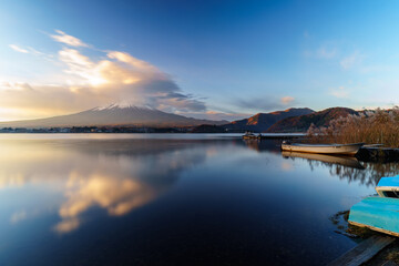Sunrise Symphony: Reflection of Mount Fuji with Glowing Cloud on Lake Surface