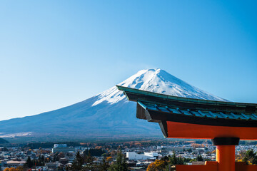 Skyline of Mount Fuji with Snow Cap in Sunlight under Blue Sky