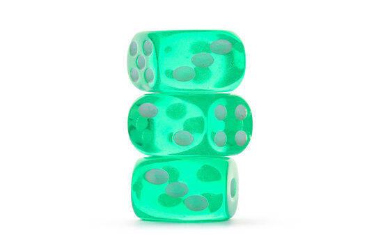 Stack of green game dices on white background