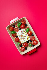 Baked feta cheese with tomatoes and olives. Healthy food. Vegetarian food.