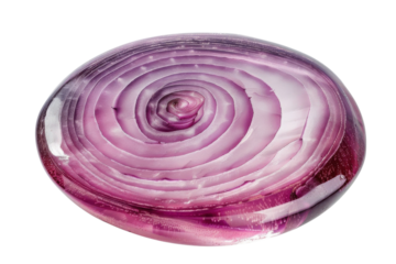 Sliced red onion with a glossy finish revealing intricate spiral patterns in kitchen lighting