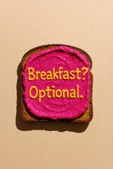 Funny Toast Quote "Breakfast? Optional." on Beet Hummus Toast — Witty Food Typography with Bright Pink Spread and Yellow Text, Minimalist Overhead Editorial Style on Beige Background
