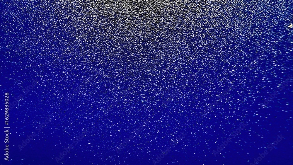 Aufkleber blue textured glitter surface with metallic speckles and gradient lighting for abstract background o