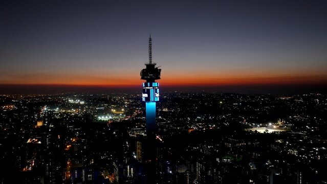 Sunset Telkom Antenna In Johannesburg Gauteng South Africa. Highrise Building Dominating The Skyline Of The Downtown. Building Landscape Skyscrapers Stunning. Industry Urban Corporate.