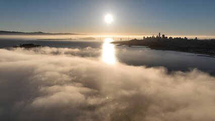 Sunrise Over Water In San Francisco California United States. Beautiful Landscape Emerging From Fog Overlooking Cityscape. Coast Clouds Seaside Summertime. Coast International Beach Panorama.