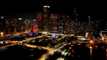 Fototapeta premium Downtown Chicago In Chicago Illinois United States. Aerial View Of A High-Rise Buildings And Traffic Showcasing Urban Life. Building Construction Skyline Bird View Amazing.