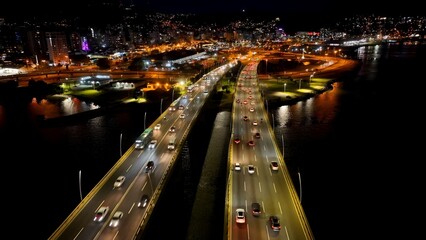 Night Traffic Bridge In Florianopolis Santa Catarina Brazil. Powerful Landscape Of The Vehicles In...