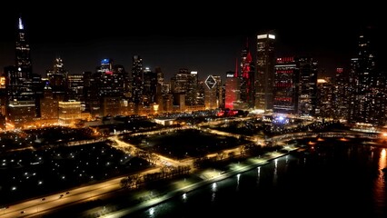 Chicago Skyline In Chicago Illinois United States. Aerial View Of A High-Rise Buildings And Traffic Showcasing Urban Life. Night Highway Road Downtown Cityscape. Night Outdoor Panorama.