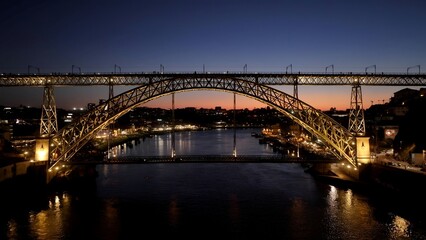 Dom Luis I Bridge In Porto Portugal. Aerial View Of Urban Railway Station With Buildings In Background. Sunset Clouds Sky Downtown Cityscape. Sunset Outdoor Downtown Famous. Porto Portugal.