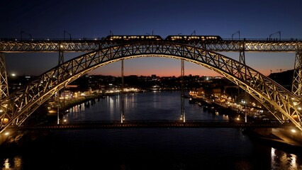 Fototapeta premium Luis I Bridge In Porto Portugal. Traffic Is Moving Across A Modern Cable-Stayed Bridge. Sunset Clouds Sky Downtown Cityscape. Sunset Outdoors Downtown . Porto Portugal.