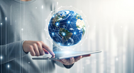 Person Holding Digital Tablet Displaying Holographic Earth Globe With Glowing Network on a Soft Blurred Background