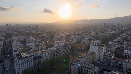 Fototapeta premium Sunset Landscape In Barcelona Spain. Amazing Skysrapers And Traffic On Street Viewed From Above. Building Construction Skyline Skyscrapers Awesome. Construction Cityscape Skyscrapers.