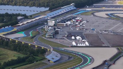 TT circuit Assen, The Netherlands. Motorcycle race track. Motorsports. Aerial video. - Powered by Adobe
