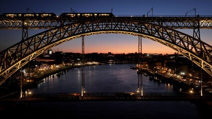 Obraz premium Dom Luis I Bridge In Porto Portugal. Transportation Hub Of Urban Railway Station In The City. Sunset Clouds Sky Downtown Cityscape. Sunset Outdoors Downtown . Porto Portugal.