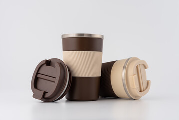 Minimal Brown Reusable Coffee Thermo Cups on White Background for Branding and Product Design