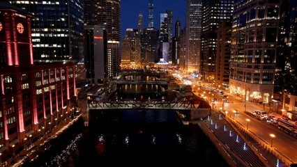 Obraz premium Night Chicago Skyline In Chicago Illinois United States. Birds Eye View Of Stunning Cityscape With Streets And Buildings. Building Town Sky Illuminated Urban. Illuminated Landmark. Chicago Illinois.