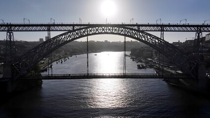 Naklejka premium Luis I Bridge In Porto Portugal. Iconic Structure Of Bridge Connecting Landmarks Streets. Metropolitan Landscape Commercial Building Amazing. Commercial Building. Porto Portugal.