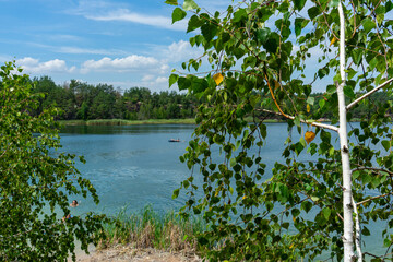 The abandoned Korostyshiv quarry, with its deep blue waters and rugged cliffs, has become a scenic...