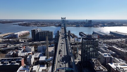 Benjamin Franklin Bridge In Philadelphia Pennsylvania United States. Highway Interchange Crossing City With Traffic Jam. Business Sky Downtown Cityscape. Business Backgrounds Panorama.