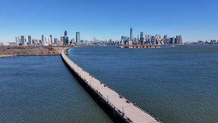 Liberty Park In Jersey City New Jersey United States. Drone Captures A Garden With Sidewalks Surrounded By Lush Trees. Industry Skyline Commercial Building Awesome.