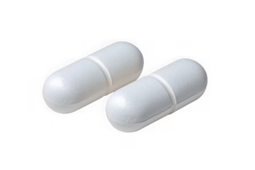 Two white oval shaped capsules isolated on transparent background