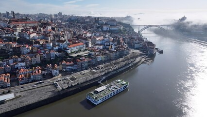 Fototapeta premium Porto Skyline In Porto Portugal. Tropical River With A Scenic Forest Trees Viewed From Above. Industrial Skyline Skyscrapers Amazing. Industrial Cityscape. Porto Portugal.