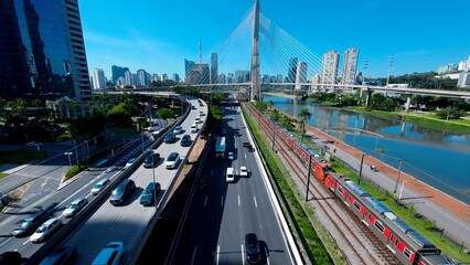Cable Stayed Bridge In Cityscape Sao Paulo Brazil. Bridge Showcasing The Traffic Flowing Across In...