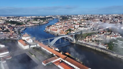 Luis I Bridge In Porto Portugal. Cars Driving Towards Downtown City On The Famous Bridge....
