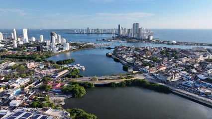 Cartagena Bay In Cartagena Bolivar Colombia. Modern City Center With Skyscrapers Reflecting The Urban Life. Business Sky Downtown Cityscape. Business Panning Wide. Cartagena Bolivar.