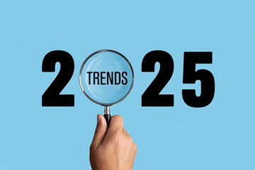 2025 trends concept with magnifying glass future forecast search business innovation minimalist blue background.