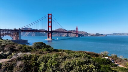 Golden Gate Bridge In San Francisco California United States. Bridge Showcasing The Traffic Flowing Across In The City. Town Sky Clouds Backgrounds Urban. Town Outdoor Downtown Panning Wide.