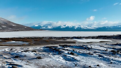 Argentino Lake In El Calafate Patagonia Argentina. Tropical River With A Scenic Forest Trees Viewed From Above. Nature Travel Destinations Snow Covered Forest Trees. Nature Landmark Aerial View.
