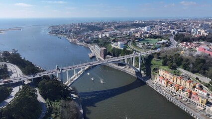 Naklejka premium Porto Skyline In Porto Portugal. Aerial View Of A Bustling Downtown Cityscape With Modern Buildings. Metropole Landscape Company Building Vibrant. Metropole Corporate Town. Porto Portugal.