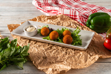 Crispy Delights With Sauce in Rustic Style