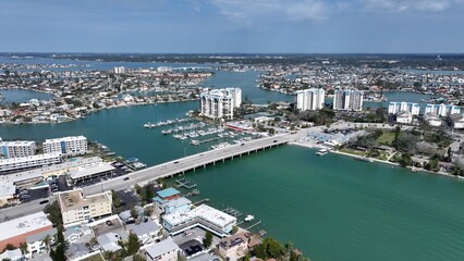Fototapeta premium St. Pete Beach In Saint Petersburg Florida United States. Aerial View Of A Bustling City With High-Rise Buildings And Traffic. Coast Horizon Seaside Summertime. Coast Panoramic.