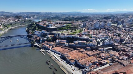 Obraz premium Morro Garden In Gaia District Of Porto Portugal. Drone Captures A Garden With Sidewalks Surrounded By Lush Trees. Industry Skyline Commercial Building Awesome.