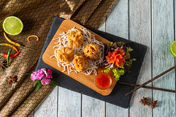 Enjoying Dumplings on a Rustic Plate