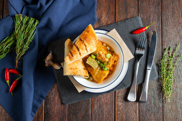 Savory Delight of Homemade Stew and Warm Bread