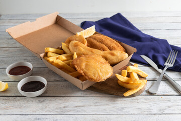 Delightful Fish and Chips Served in a Takeout Box
