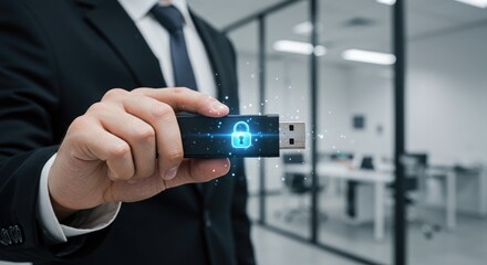 Businessman holding a secure usb flash drive with a glowing lock icon representing data protection in a professional office setting